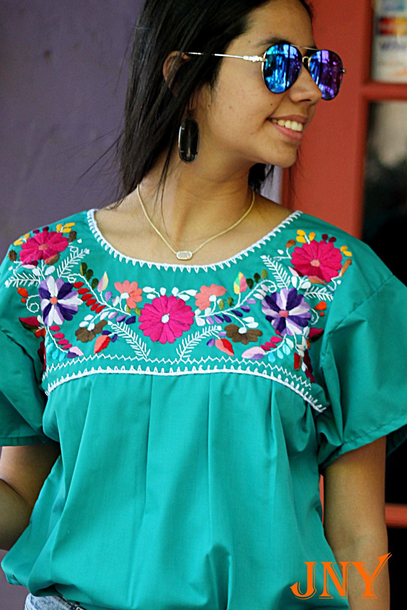 Hand-Embroidered," "Mexican Puebla Blouse," "Floral Pattern," and "Fiesta Top Teal Green